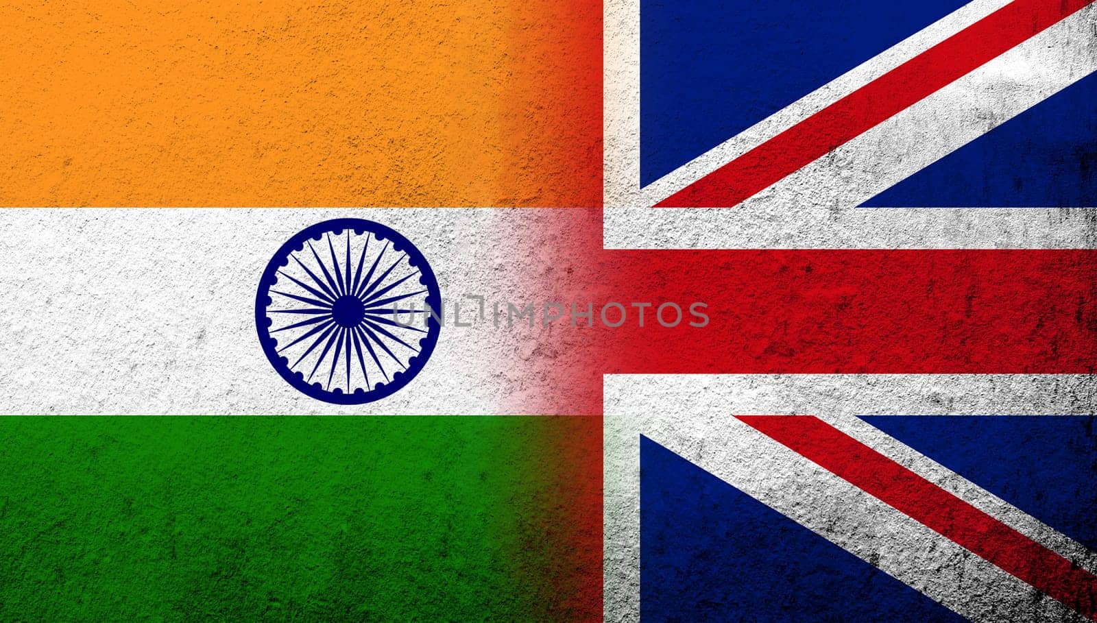 National flag of United Kingdom (Great Britain) Union Jack with The Republic of India National flag. Grunge background