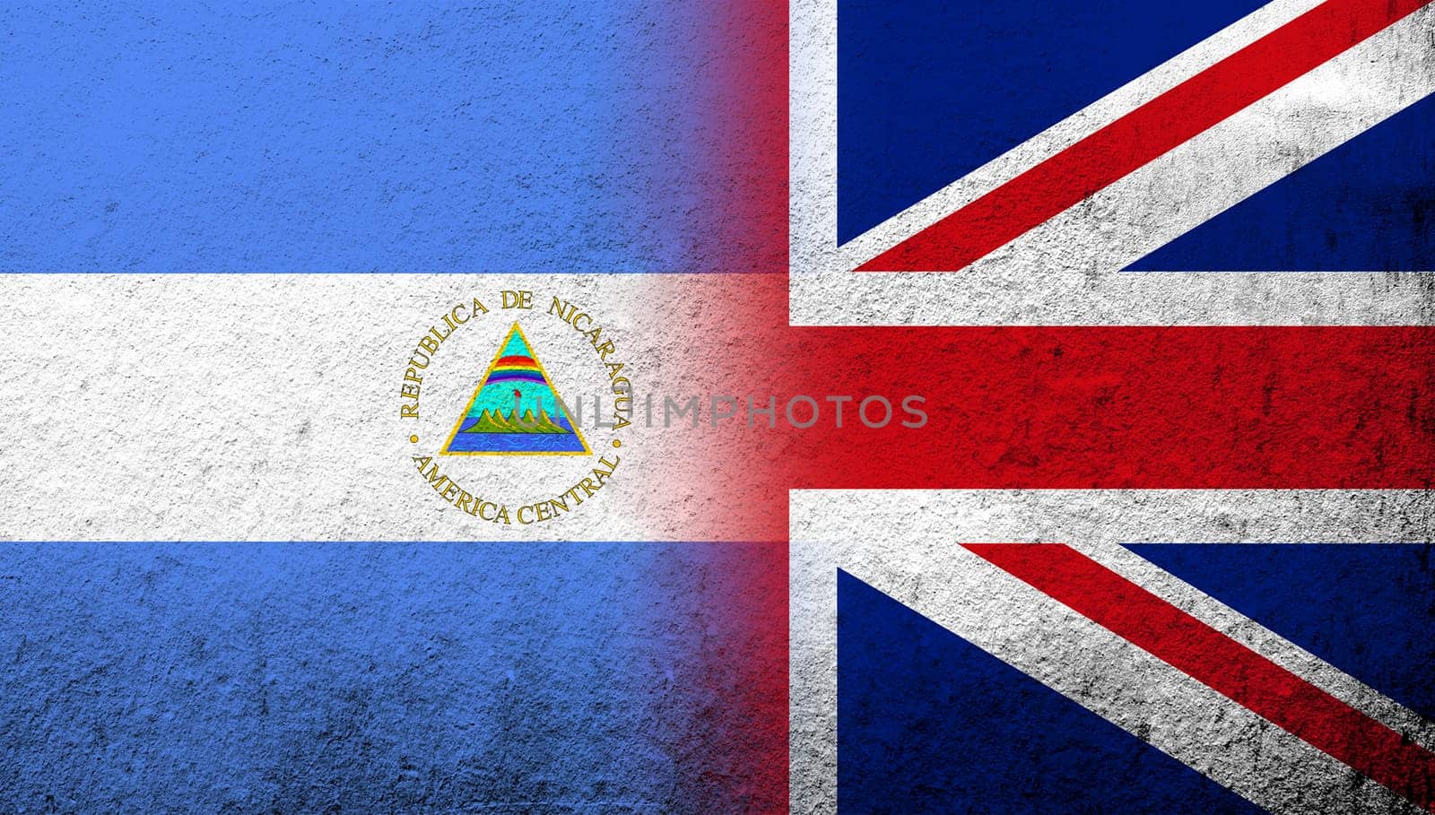 National flag of United Kingdom (Great Britain) Union Jack with The Republic of Nicaragua National flag. Grunge background