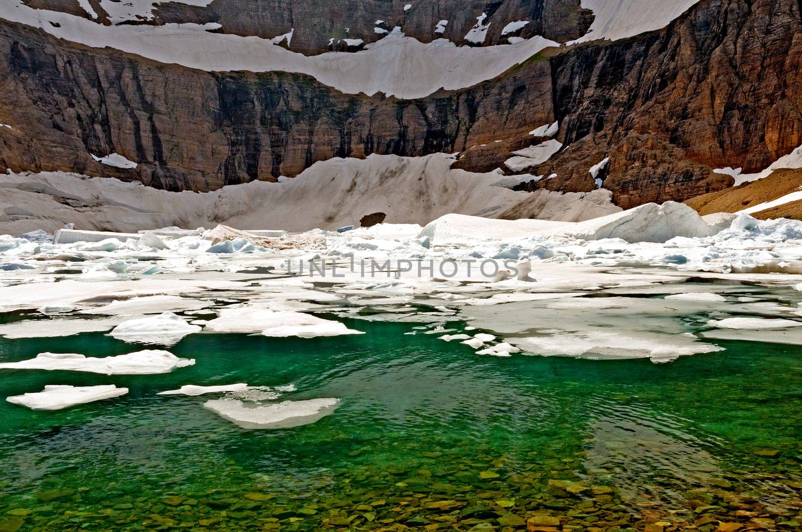 Icy Waters on an Alpine Lake on Iceberg Lake in Glacier National Park in Montana