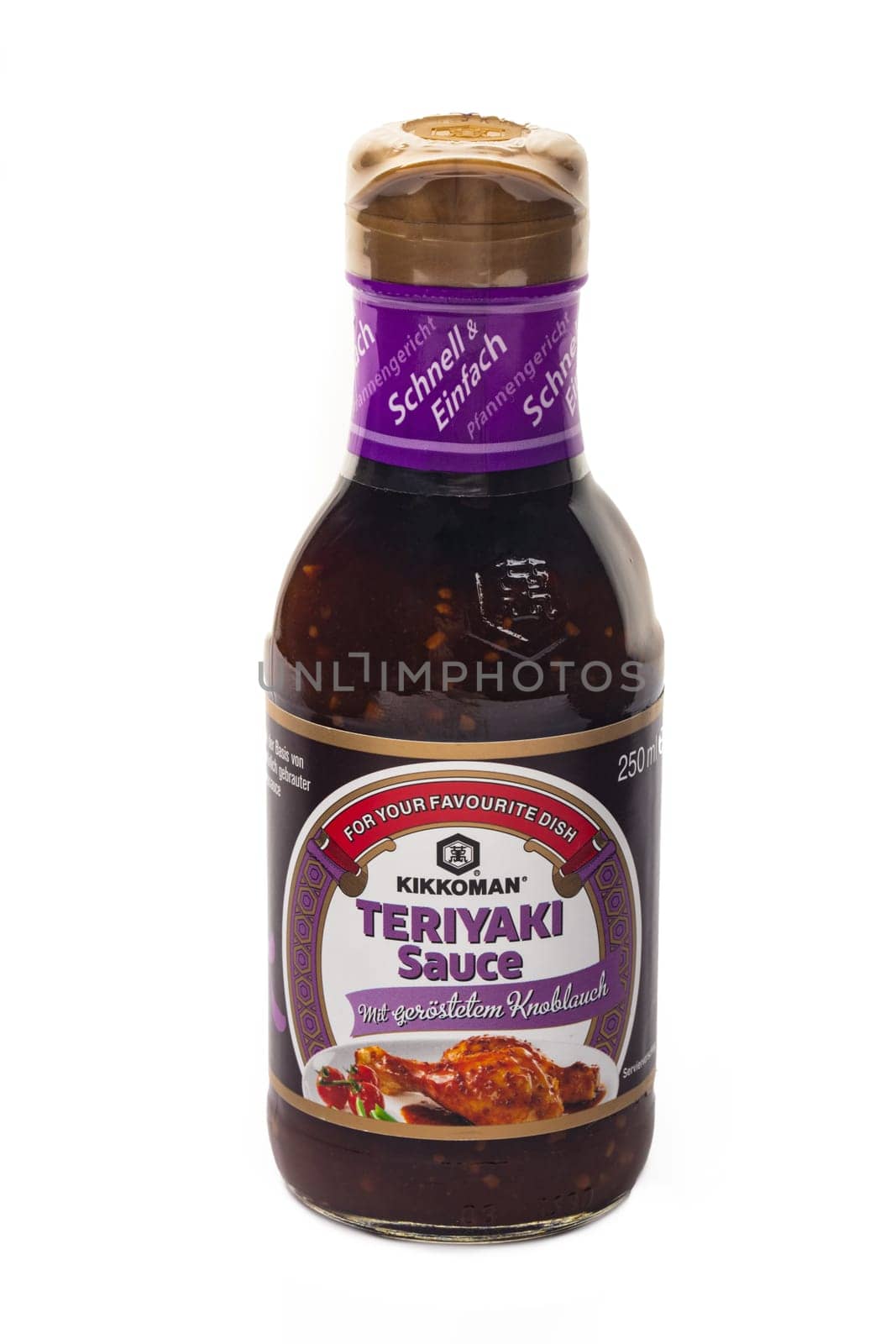 WETZLAR, GERMANY - 2022-07-17: Bottle of Kikkoman Teriyaki Sauce. In 1917 the Japanese Mogi and Takanashi families founded Noda Shoyu Co. Ltd. The company name was changed to Kikkoman Shoyu Co. Ltd. in 1964 and to Kikkoman Corporation in 1980.