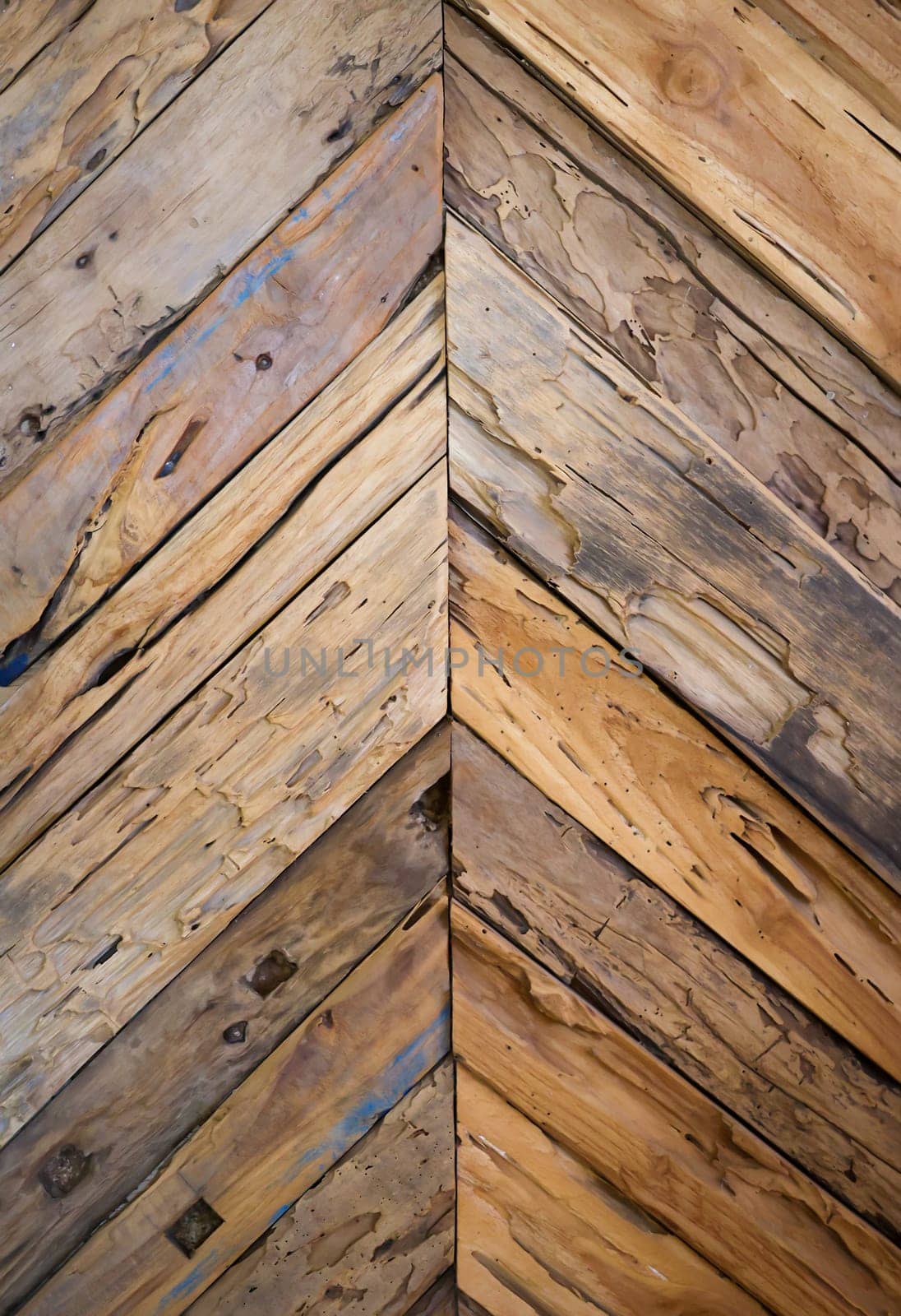 A texture of wooden boards arranged at an angle to each other.