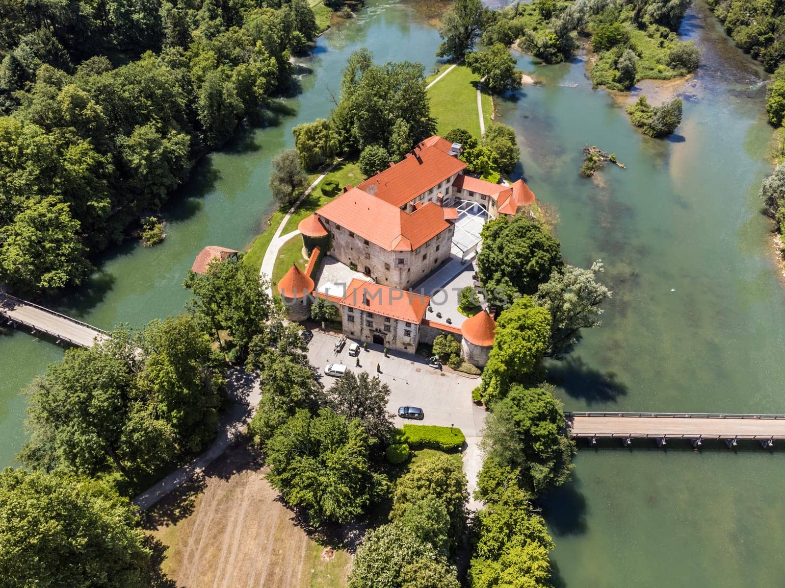 Romantic Otocec Castle on Krka River in Slovenia. Drone View
