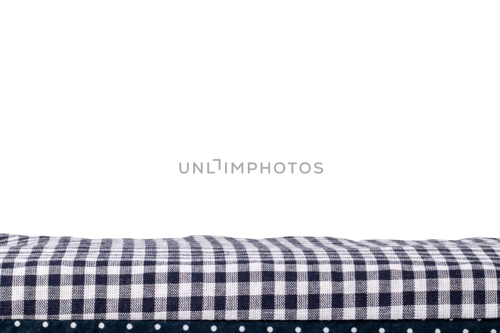 Closeup of a cherry pit filled pillow for pain and tension isolated on white background. Copy space for your product presentation montage. Macro.