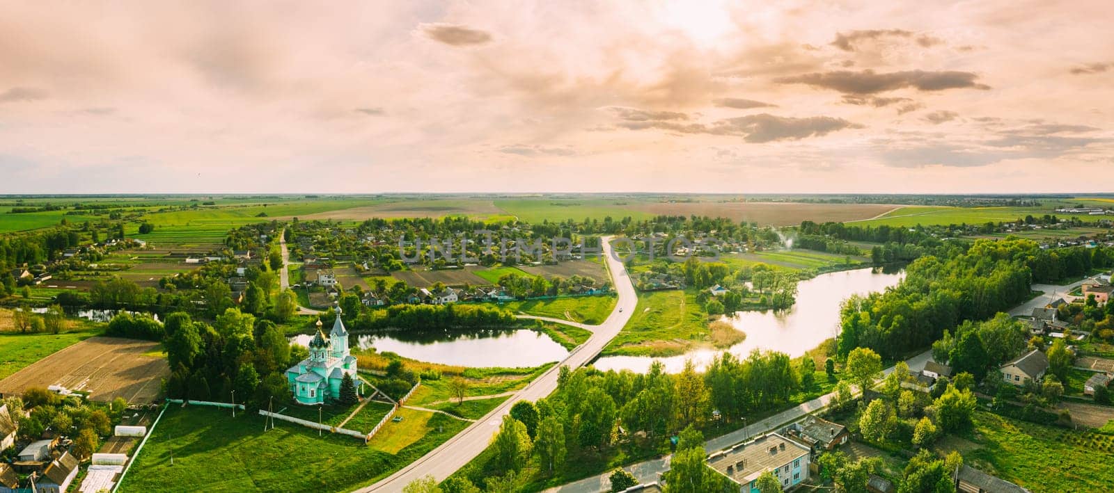 Krupets, Dobrush District, Gomel Region, Belarus. Aerial View Of Old Wooden Orthodox Church Of The Holy Trinity At Sunny Autumn Day.