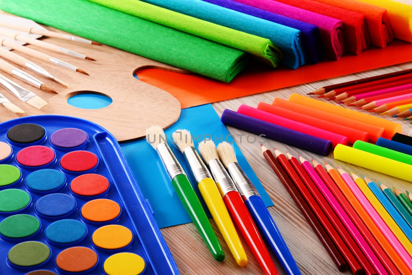 Composition with school accessories for painting and drawing.
