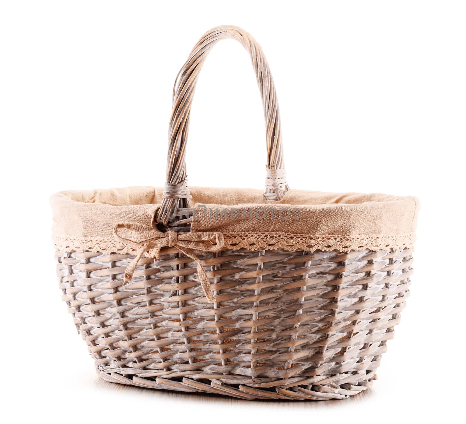 Empty wicker basket isolated on white background.