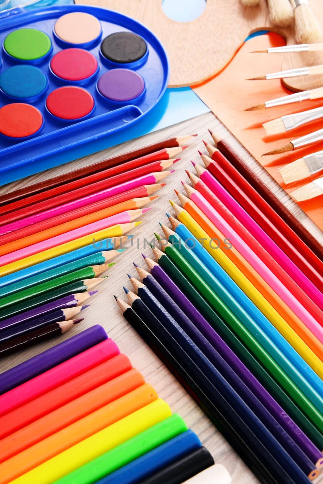 Composition with school accessories for painting and drawing.