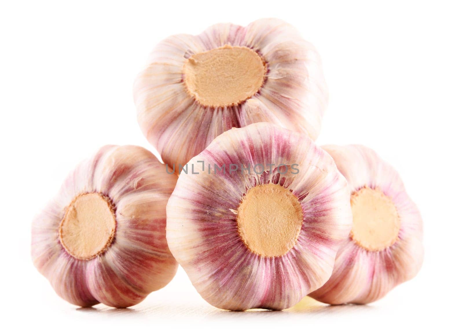 Composition with bulbs of garlic isolated on white background
