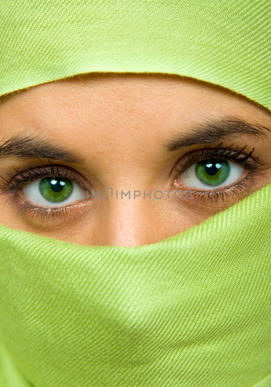 young woman with a veil close up portrait studio picture
