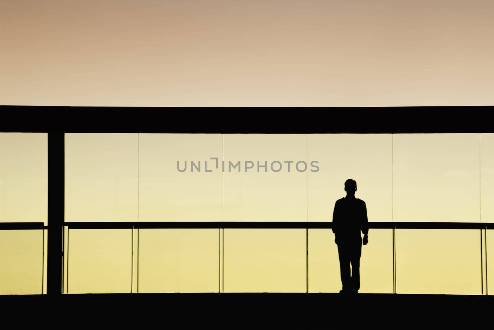 worker inside the modern building in silhouette