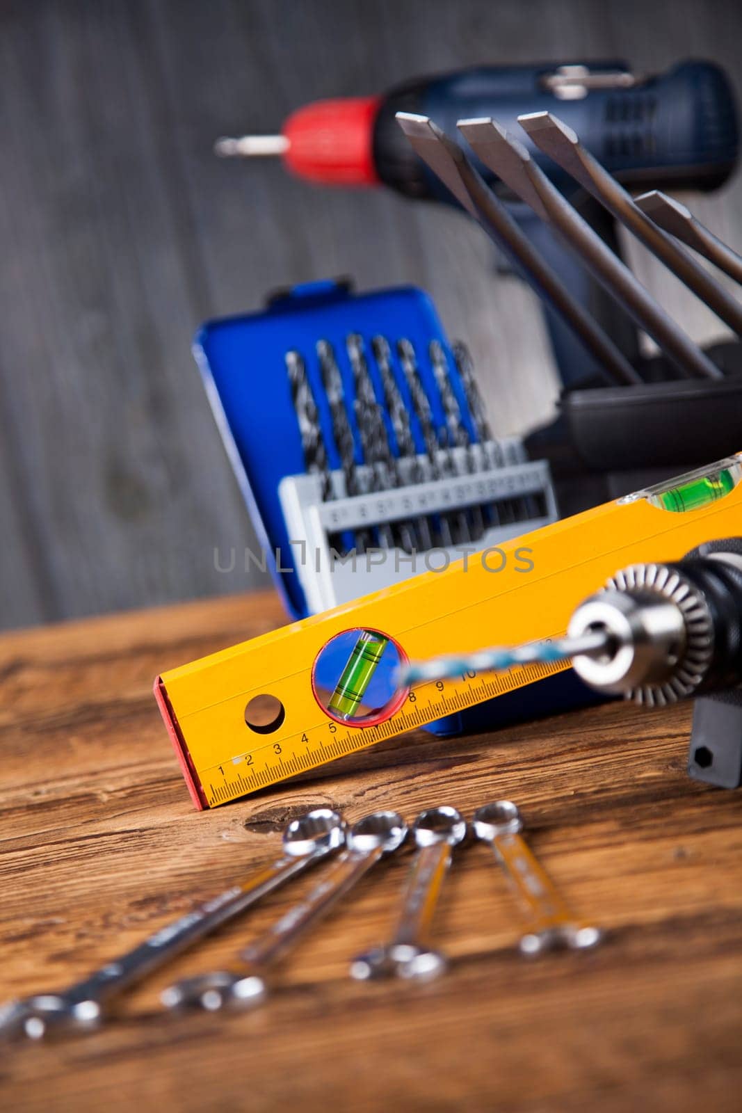 Working tools on wooden background