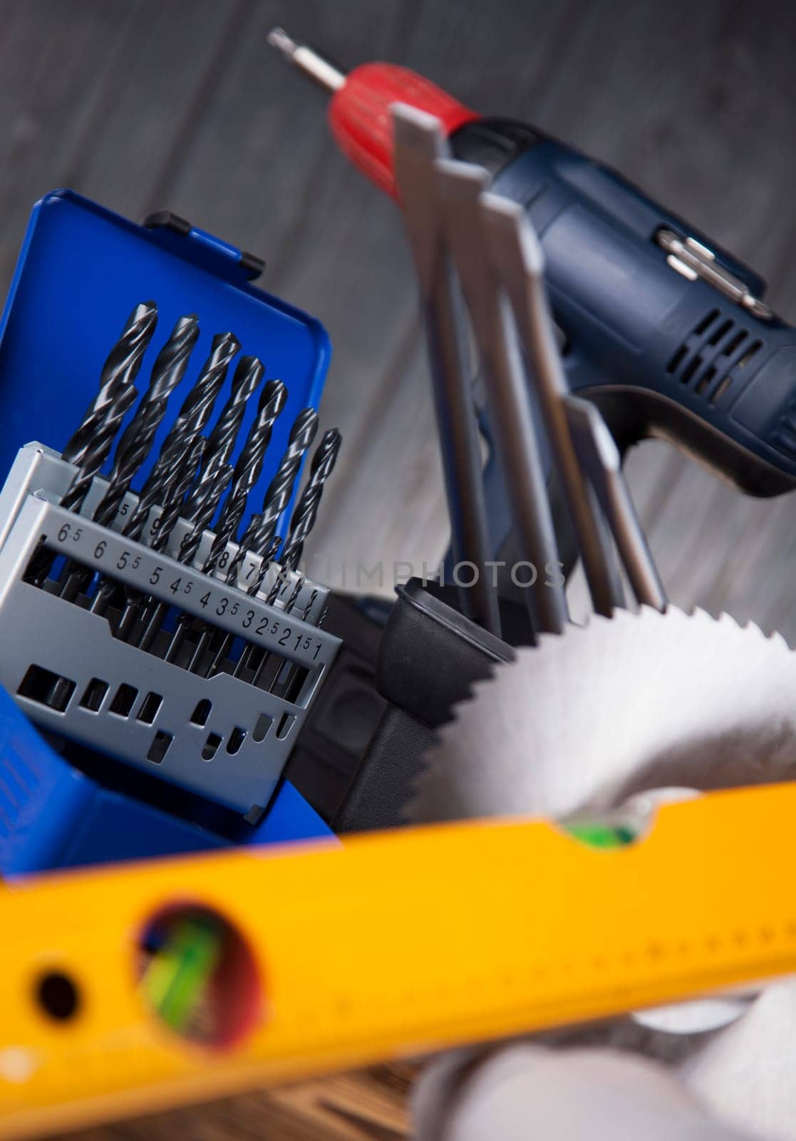 Set of different tools on wooden background