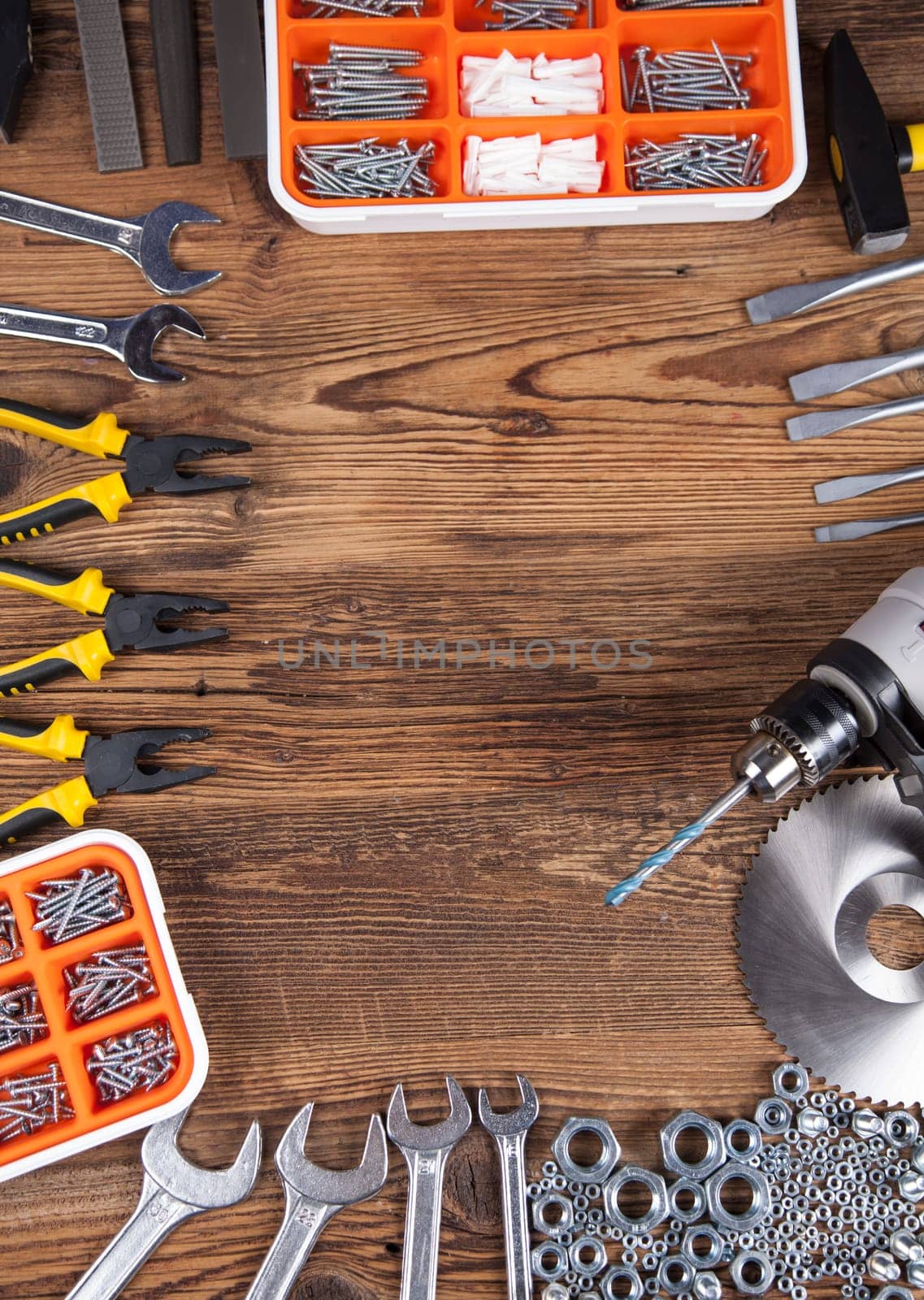 Set of different tools on wooden background