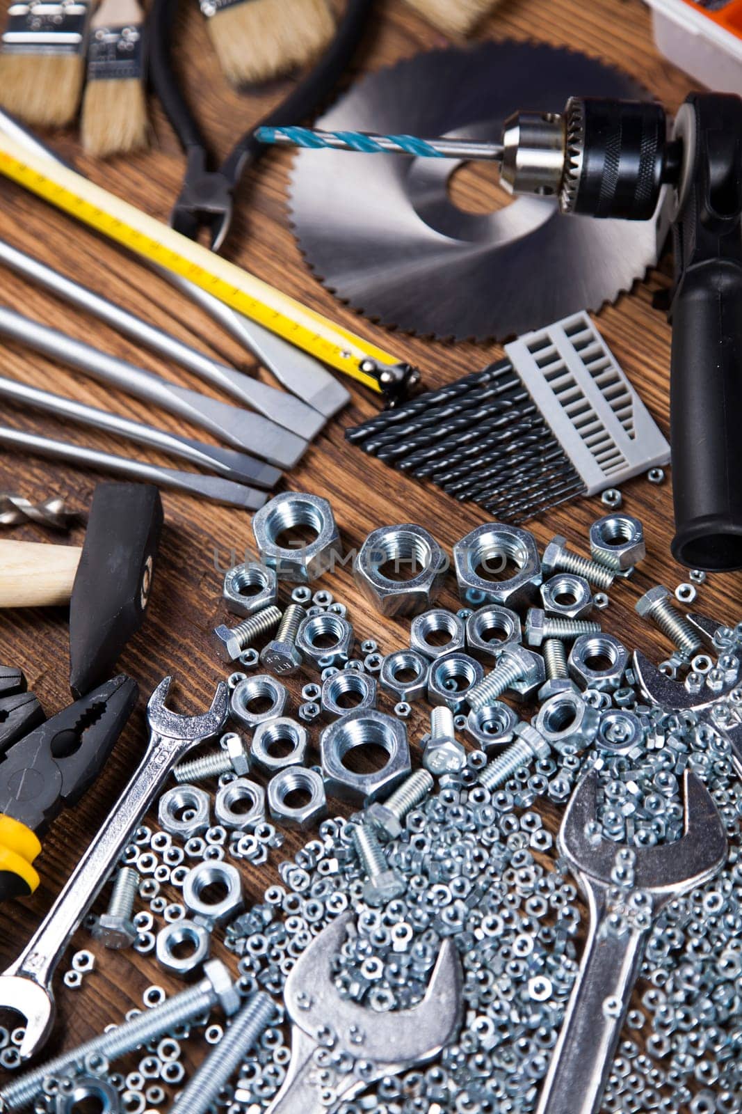 Set of different tools on wooden background