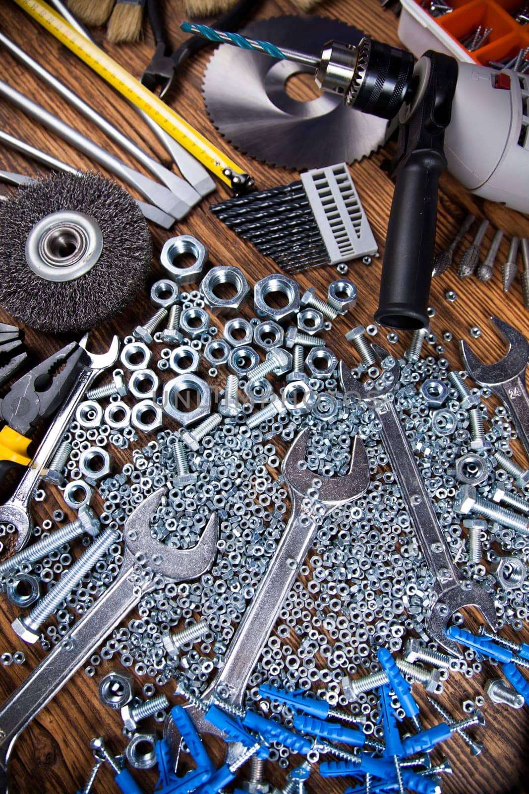 Working tools on wooden background