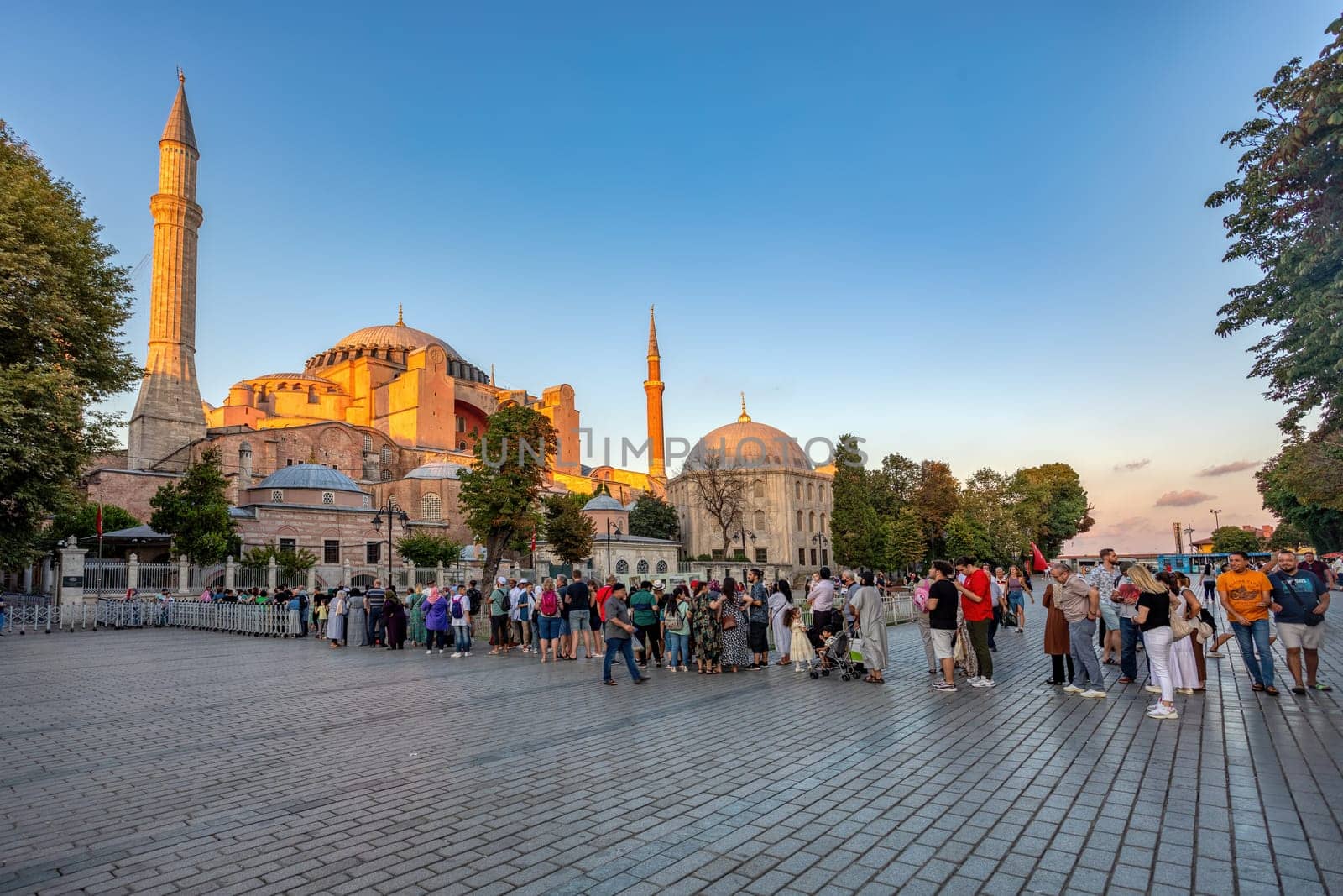 Istanbul, Turkey - August 5, 2022: People People in a long line to Hagia Sophia Camii mosque or Ayasofya (Turkish), Istanbul, Turkey.