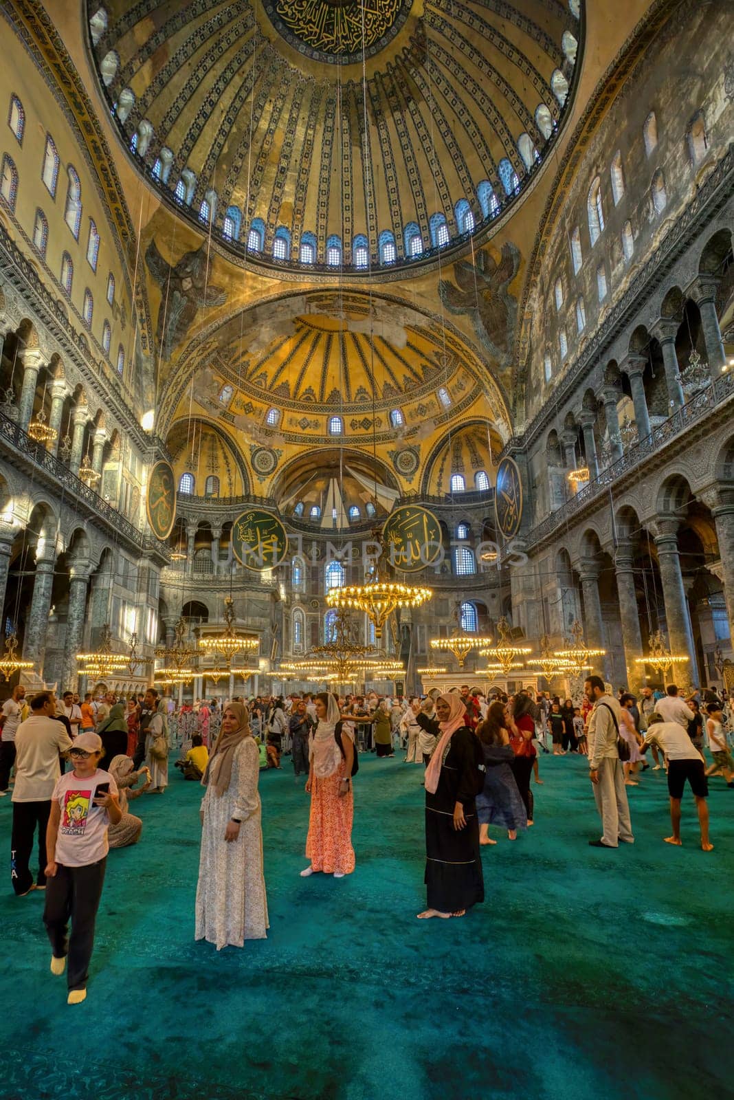 Istanbul, Turkey - August 5, 2022: Interior of ancient basilica Hagia Sophia. For almost 500 years the principal mosque of Istanbul, Aya Sofia served as model for many other Ottoman mosques