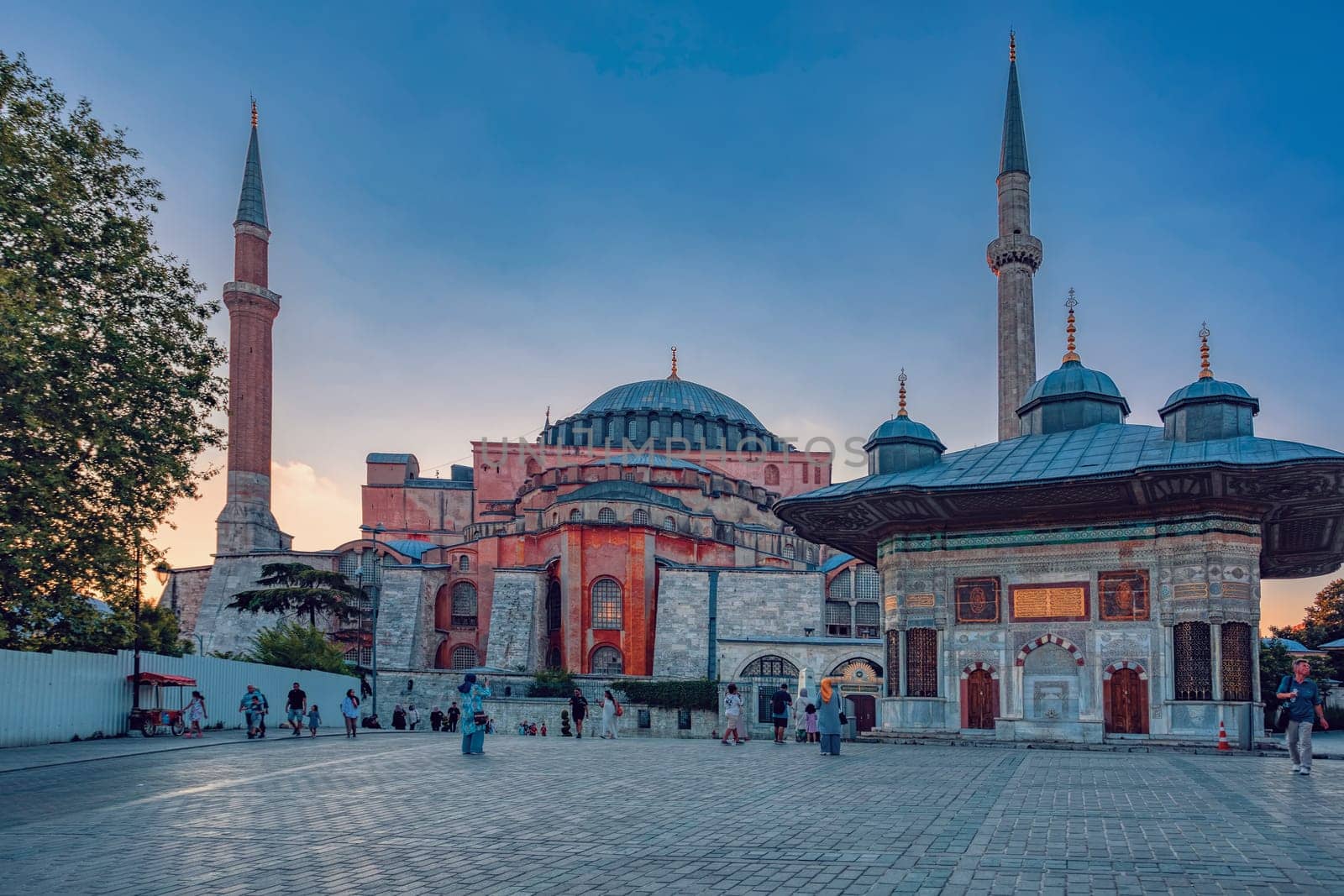 Istanbul, Turkey - August 5, 2022: People behind Hagia Sophia Camii mosque or Ayasofya (Turkish), Istanbul, Turkey.