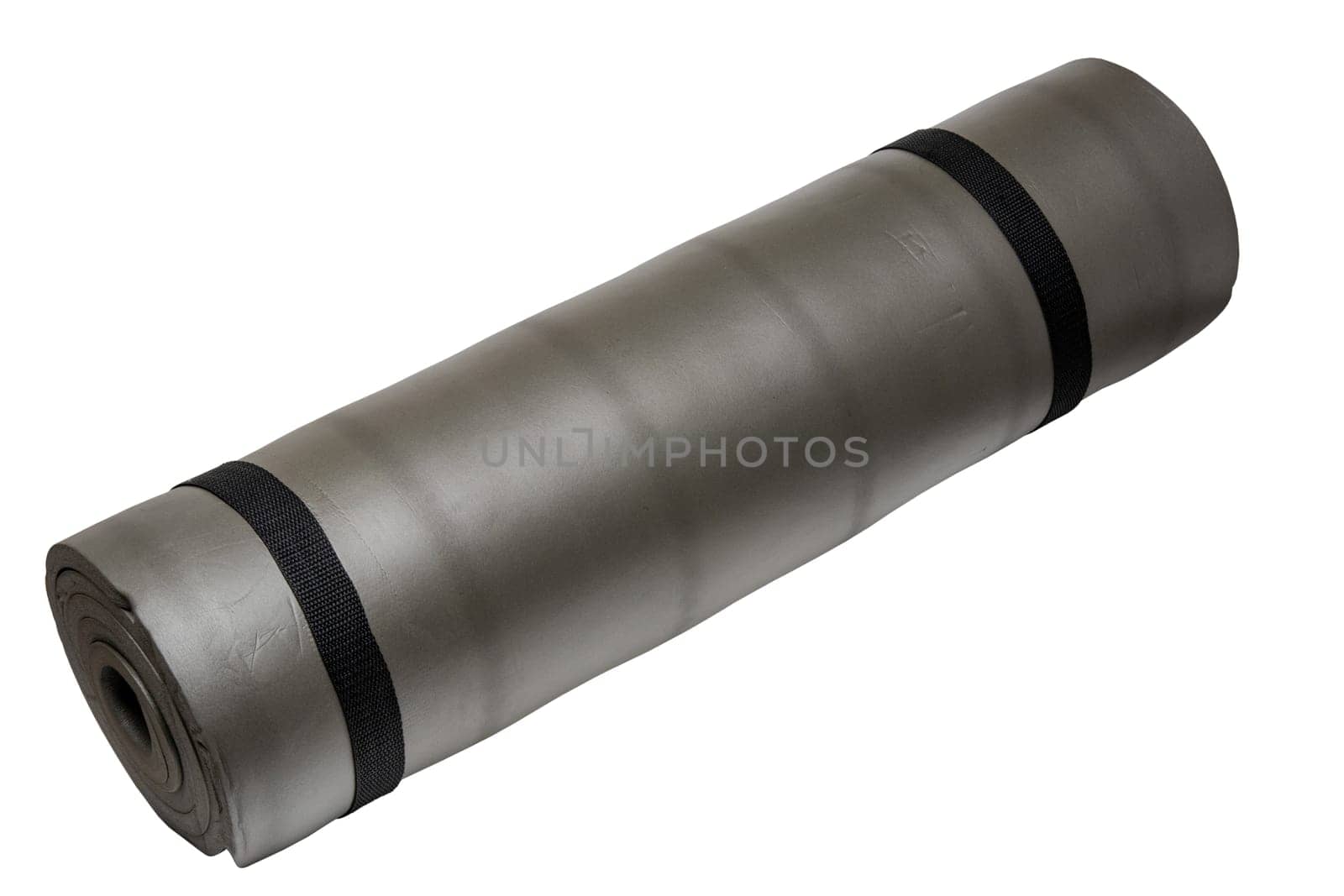 Close up view of rolled up non slip yoga mat, sports mat, gym mat, exercise mat or fitness mat isolated on white background. Clipping path. Workout at home. Health concept.