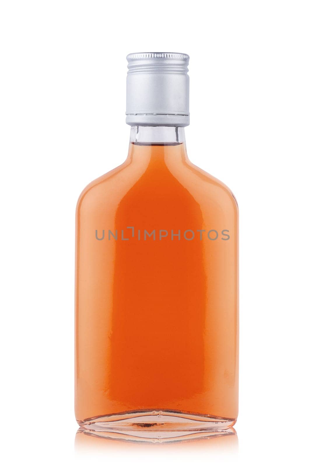 front view closeup of brandy cognac small pocket flask bottle with no label and silver metallic pilfer cap isolated on white background