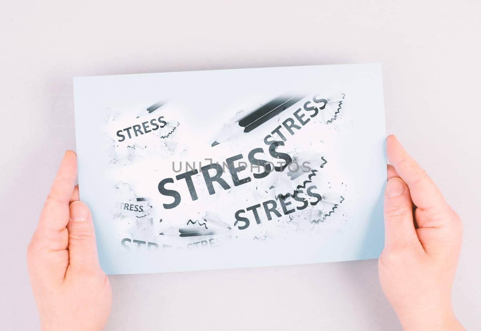 The word stress is standing on a paper, pen with eraser, burnout concept, work life balance, breakdown by exhaustion