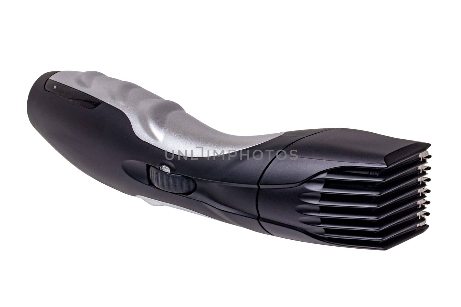 Close-up of a new black silver rechargeable beard and hair clipper isolated on a white background. Clipping path. Cordless hair and beard trimmer. Macro.