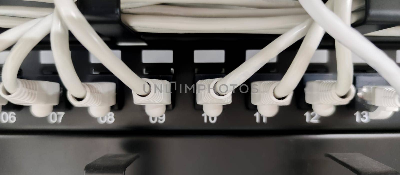 Ethernet Switch device full of wires. Closeup