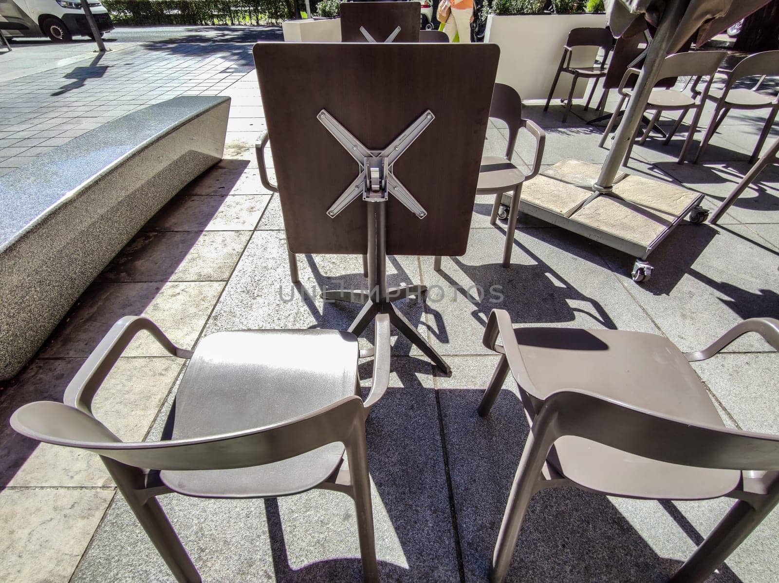 Foldable tabletop terrace tables. Terrace restaurant furniture concept