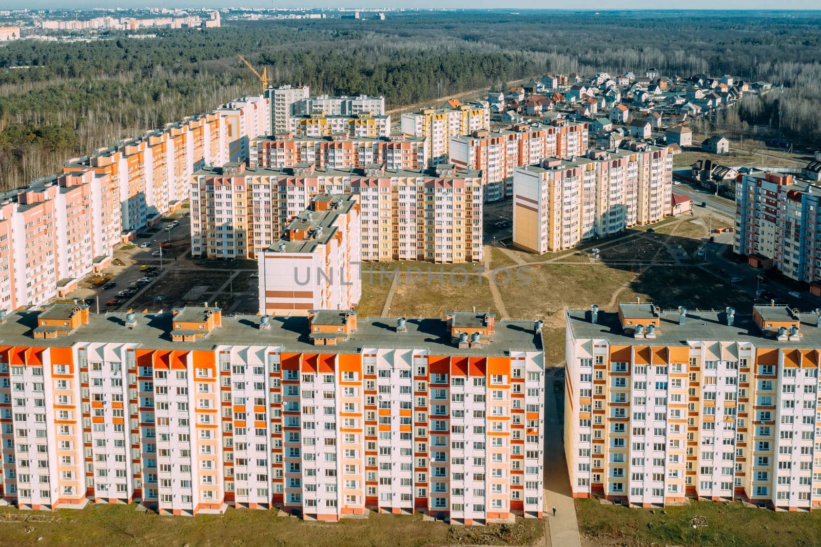 Gomel, Belarus. Aerial Bird's-eye View Of New Residential Multi-storey Houses. Cityscape Skyline In Sunny Spring Day. Real Estate, Development Industry. High-rise Buildings.