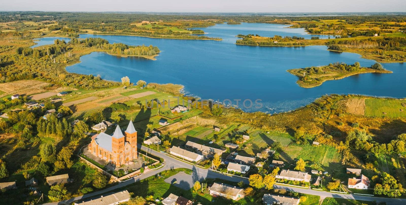 Ikazn, Braslaw District, Vitebsk Voblast, Belarus. Aerial View Of Church of the Body of God.