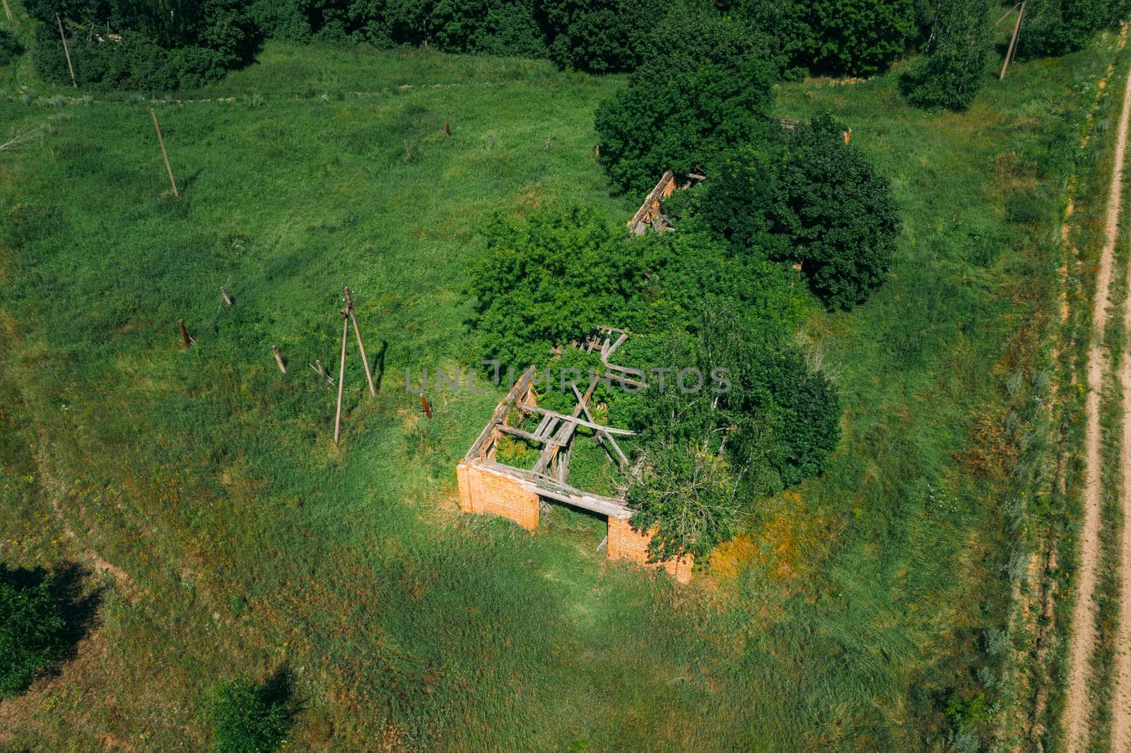 Belarus. Aerial View Of Ruined Cowshed In Chernobyl Zone. Chornobyl Catastrophe Disasters. Dilapidated House In Belarusian Village. Whole Villages Must Be Disposed. Chernobyl Resettlement Zone.