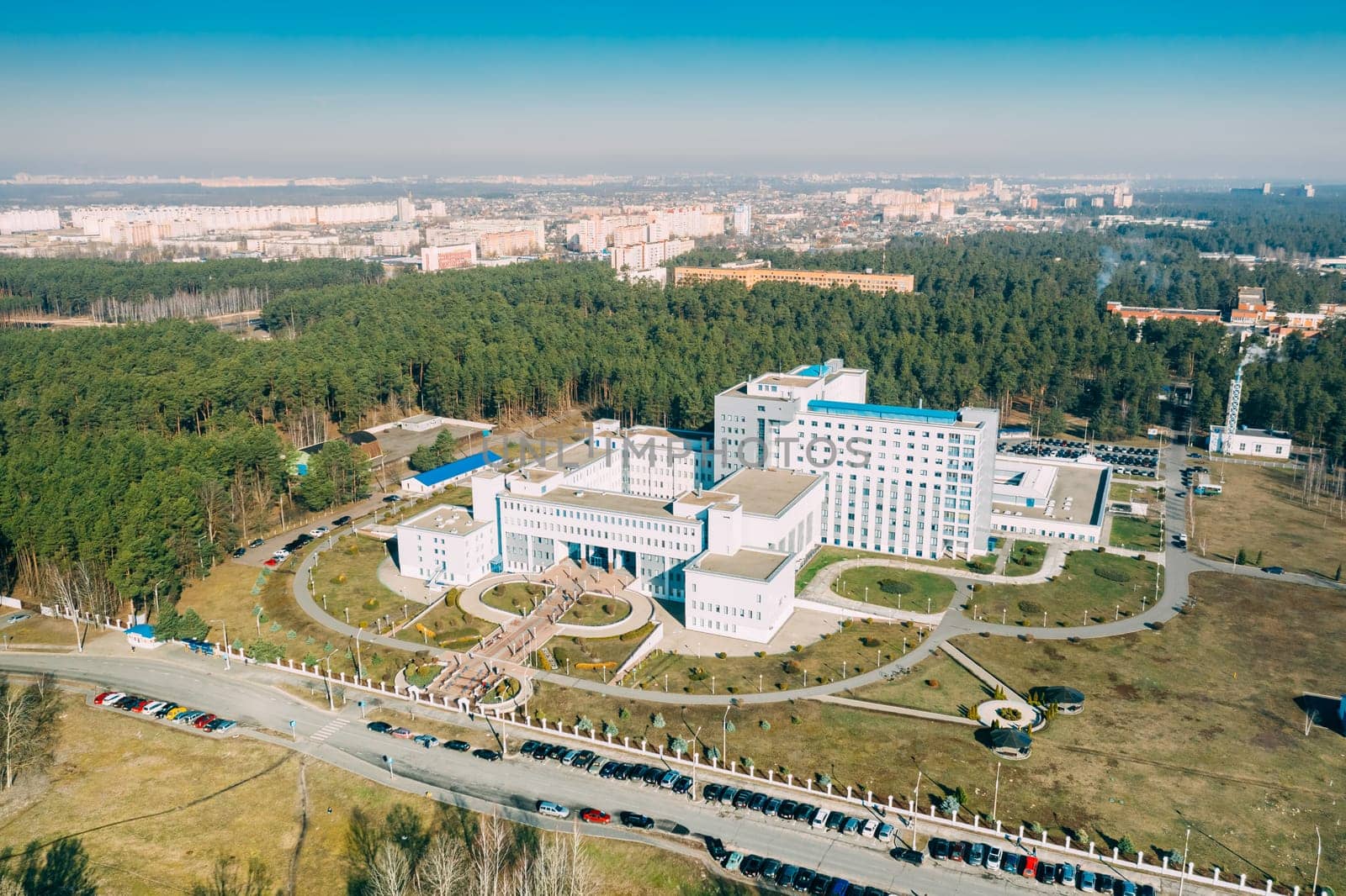 Gomel, Belarus. Aerial View OF Building Of Republican Scientific Center For Radiation Medicine And Human Ecology In Spring Sunny Day. Top View. Drone View. Bird's Eye View.