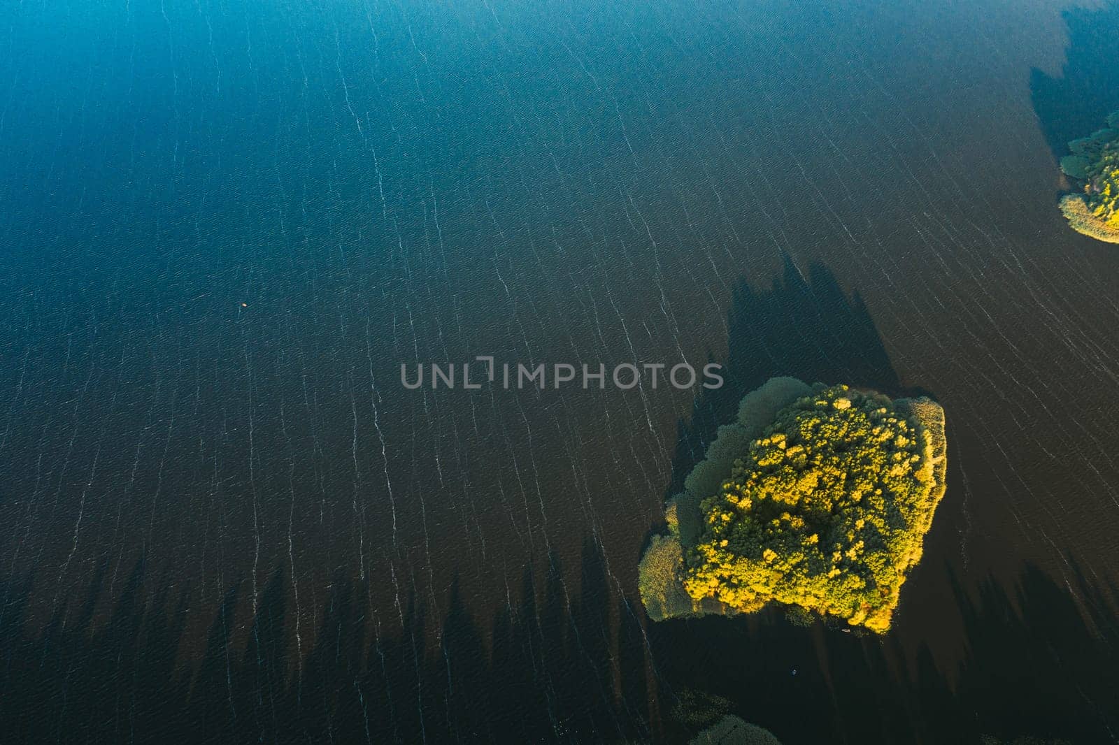 Lyepyel, Lepel Lake, Beloozerny District, Vitebsk Region. Aerial View Of Island On Lepel Lake In Autumn Morning. Morning Fog Over Lepel Lake. Top View Of European Nature From High Attitude In Autumn. Bird's Eye View. Flat View.