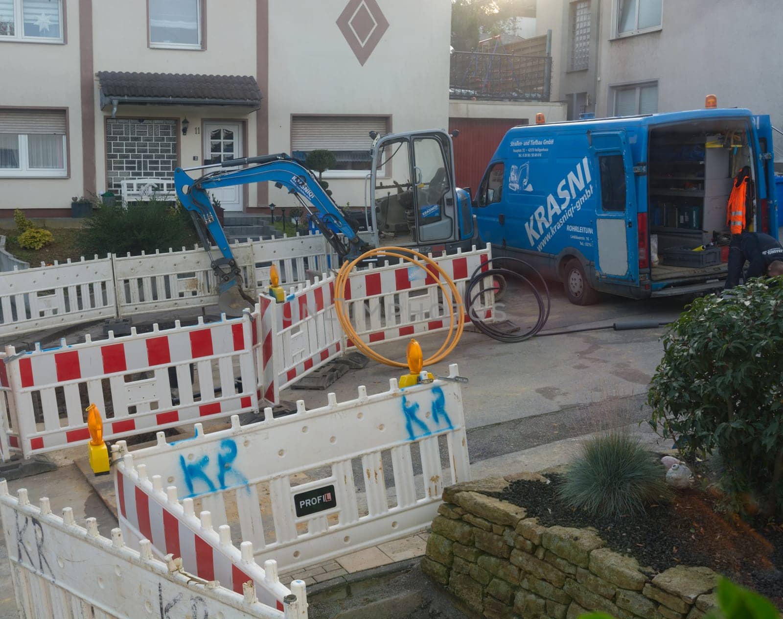 HEILIGENHAUS, NRW - OCTOBER 29, 2019:.Civil engineering works for the installation of gas, water and power lines for a new environmentally friendly fuel cell heating