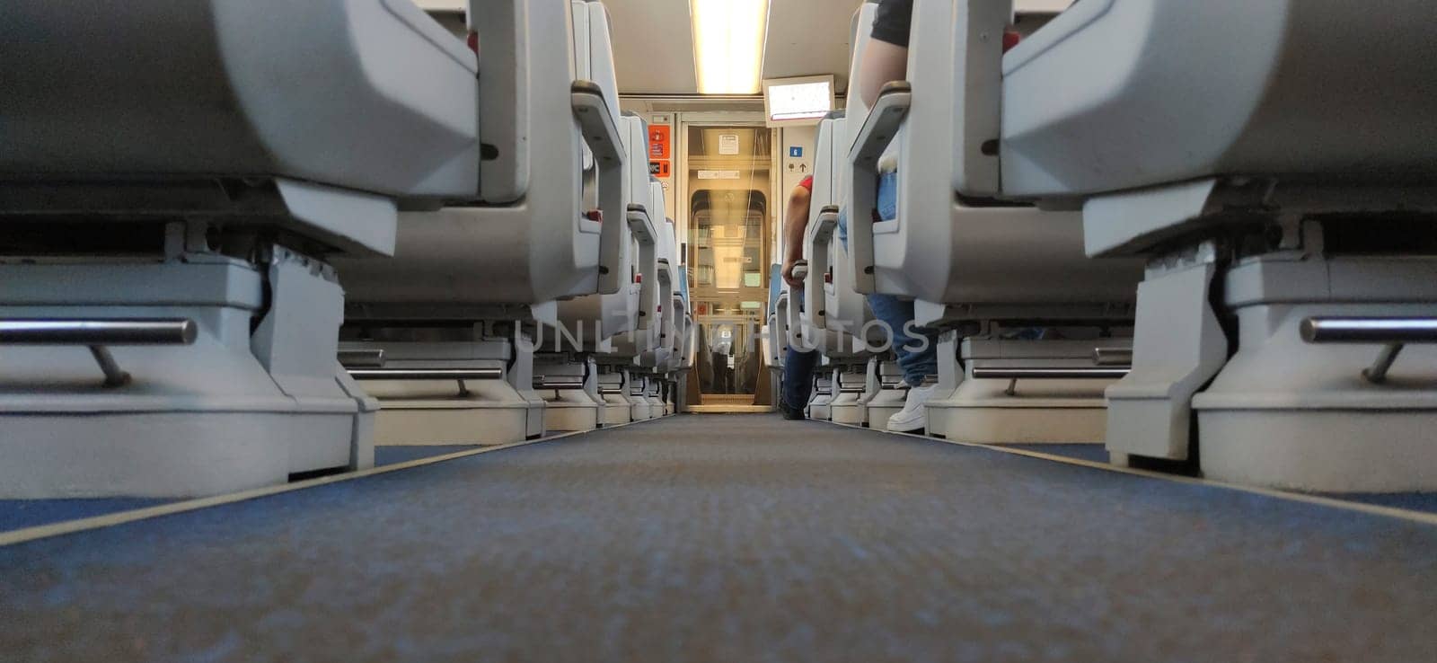 Normal class train carriage corridor. Ground view