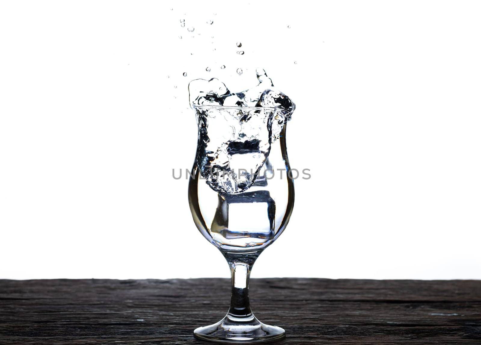 The image of pouring drinking water, into a glass, that makes one feel refreshed isolated on white background, Splashing water, Sparkling water