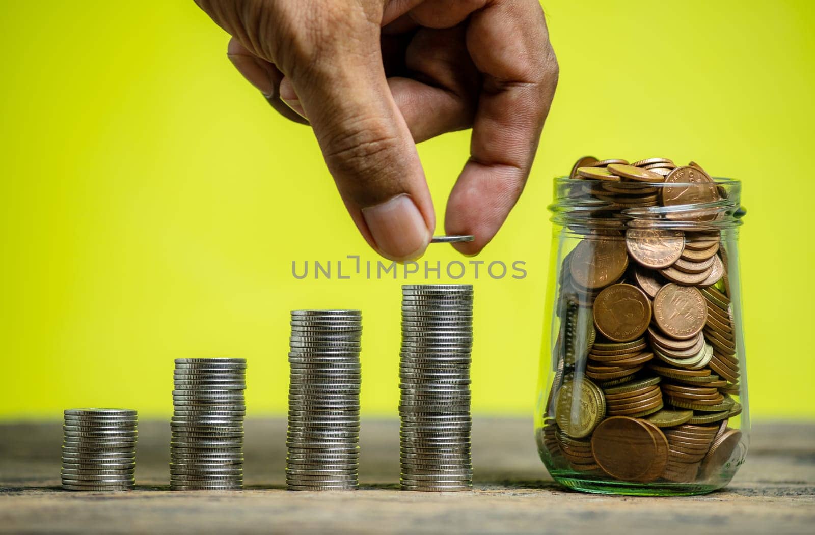 Save money and account banking for finance concept, Hand bank with coin on blurred background, Save Monney for Investors Using Internet to Trade Stocks or Trade Fund