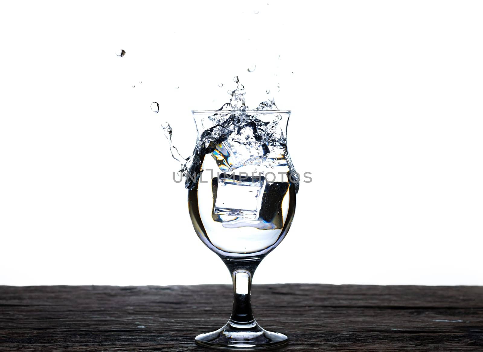 The image of pouring drinking water, into a glass, that makes one feel refreshed isolated on white background, Splashing water, Sparkling water