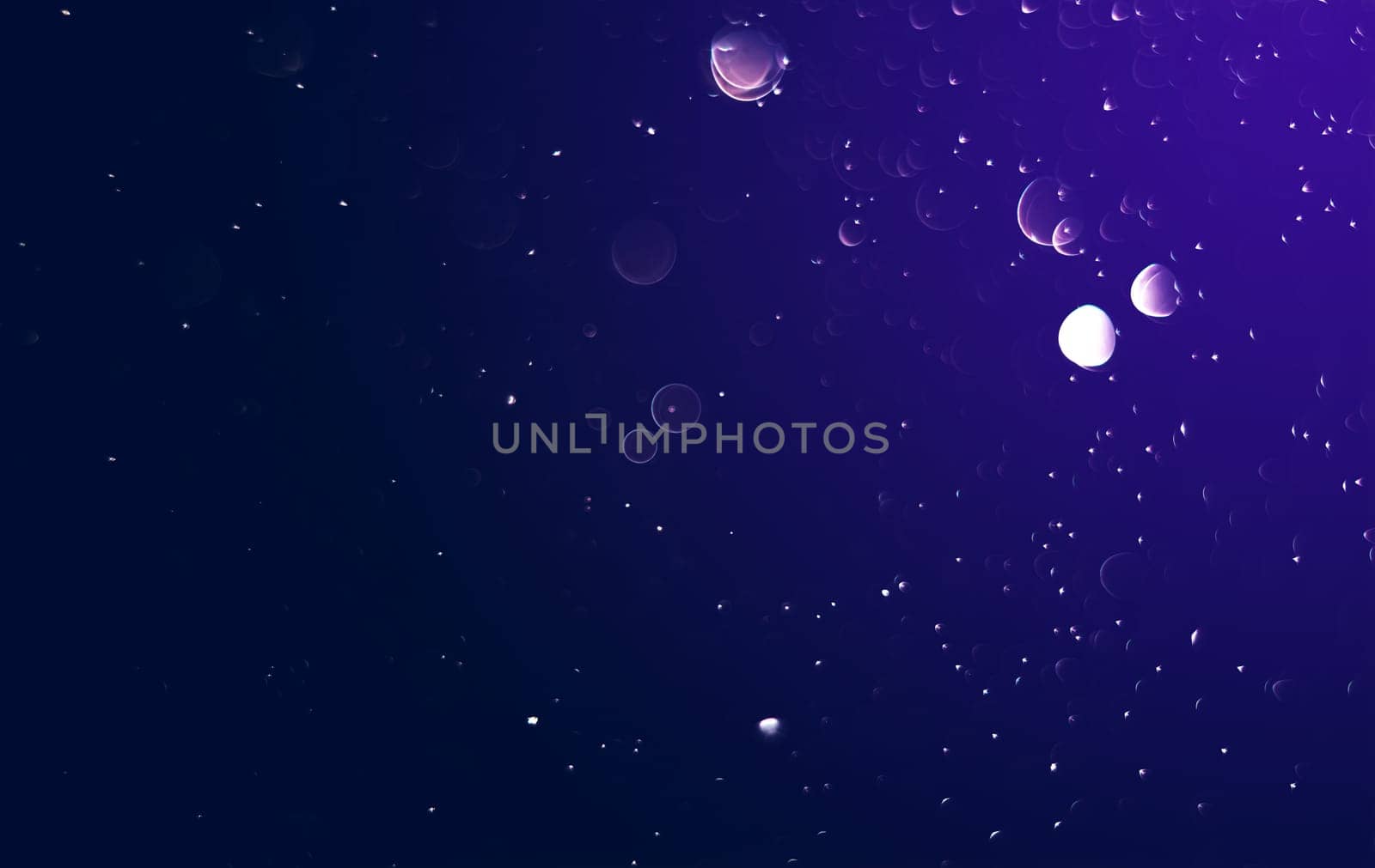 Light abstract dark bokeh christmas circle color glitter blurred black background
