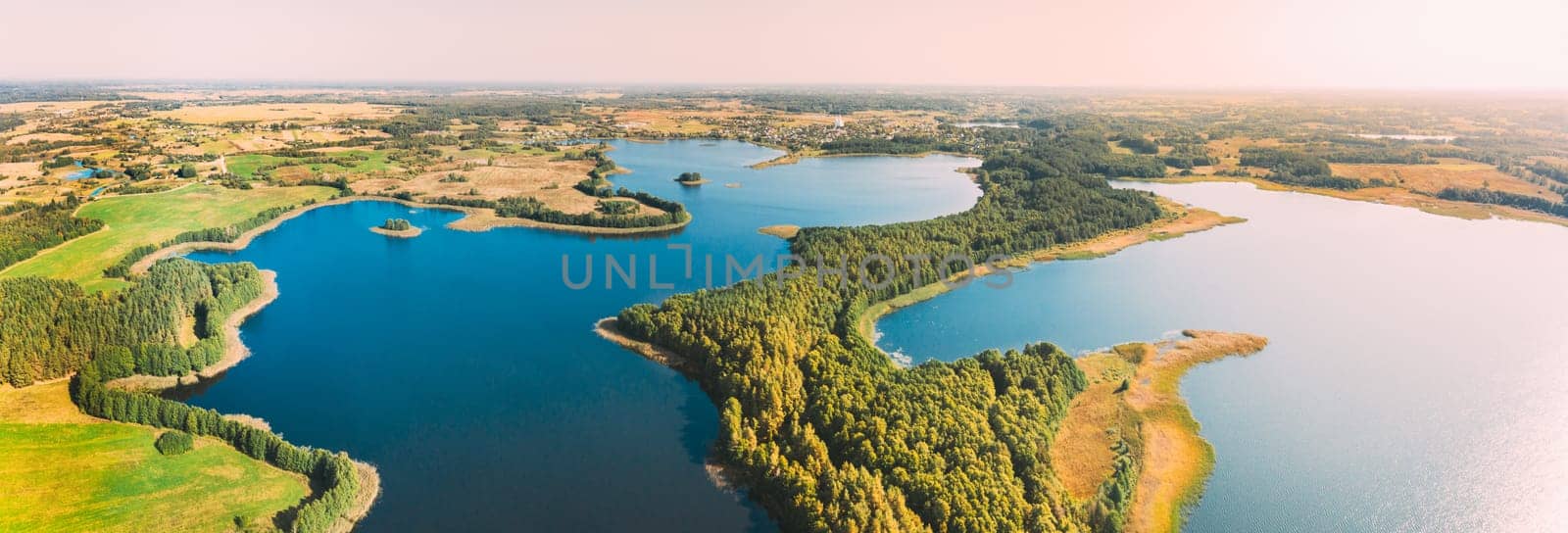 Braslaw District, Vitebsk Voblast, Belarus. Aerial View Of Nedrovo Lake, Green Forest Landscape. Top View Of Beautiful European Nature From High Attitude. Bird's Eye View. Famous Lakes. Panorama.