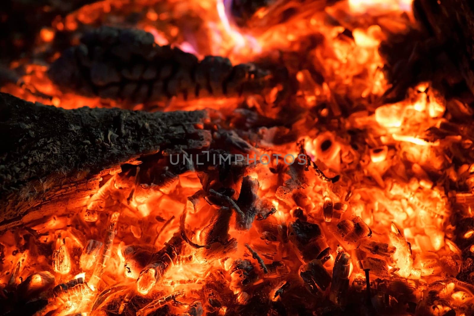 Fire and embers at the campfire