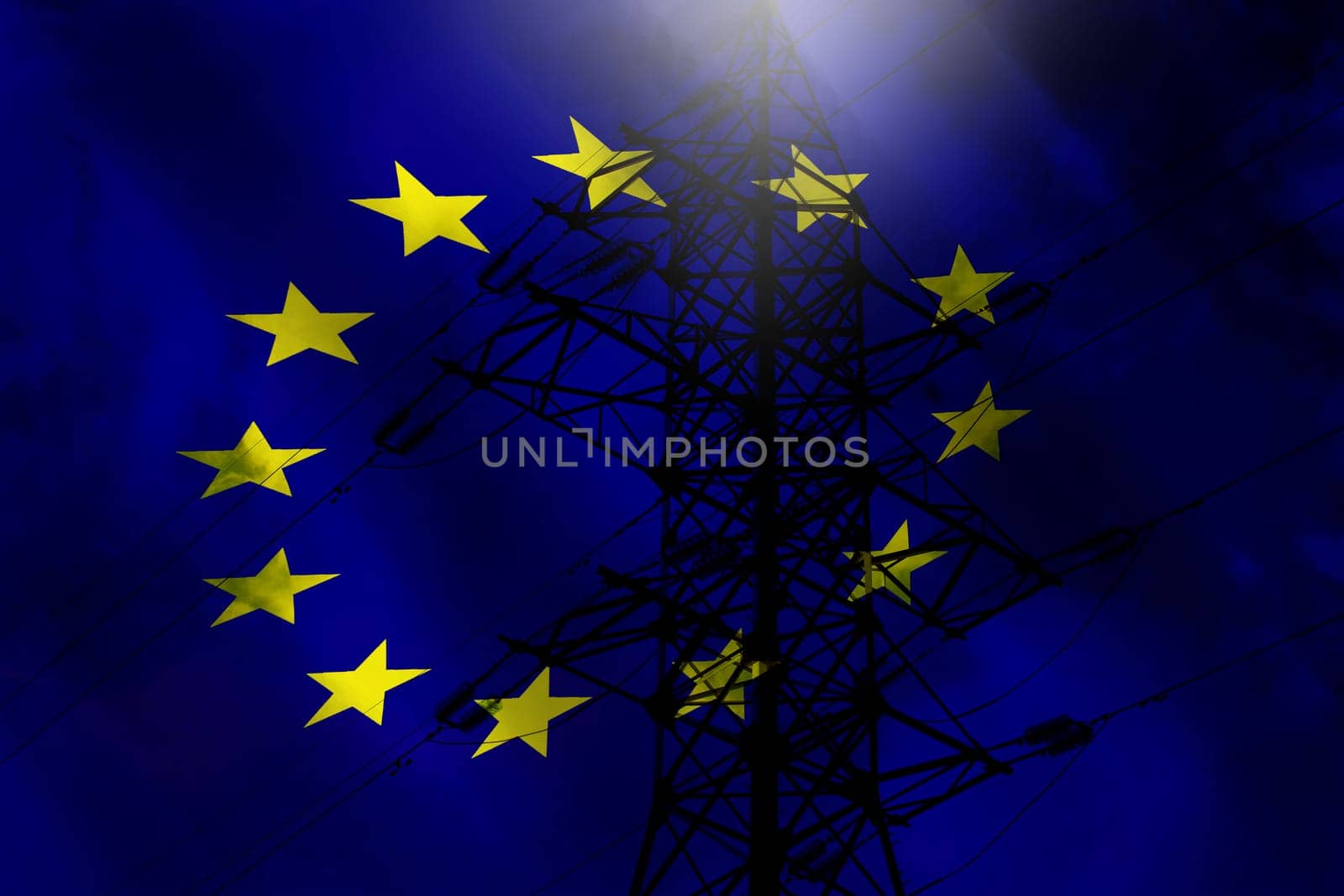 Power plant against the background of a dark sky and the flag of the European Union. Energy crisis in Europe.