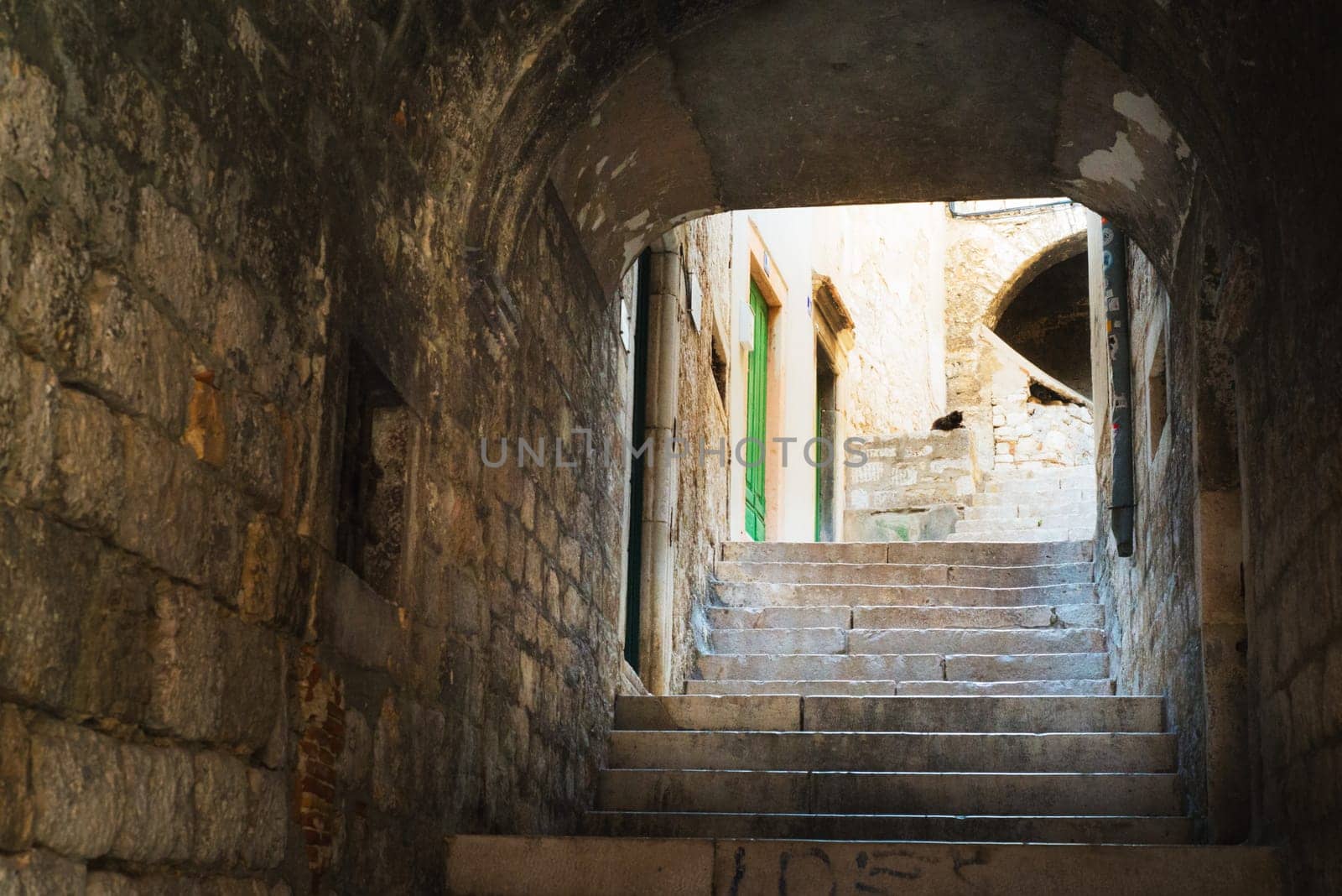 Steep stairs and streets of sibenik with a cat