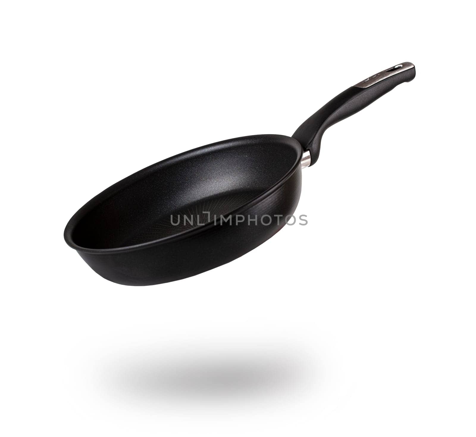 The empty frying pan isolated on white background