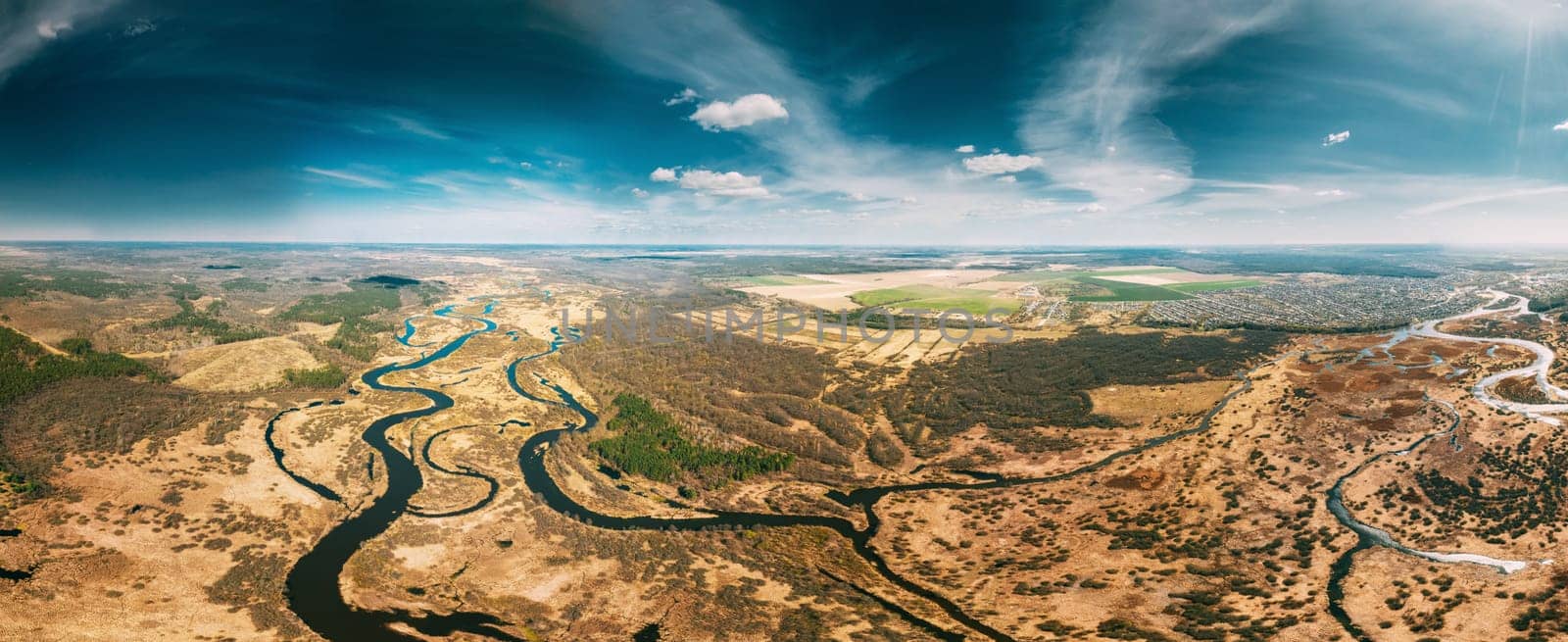 Aerial View Curved River In Early Spring Landscape. Top View Of Beautiful European Nature From High Attitude. Drone View. Bird's Eye View. Panorama, Panoramic View.