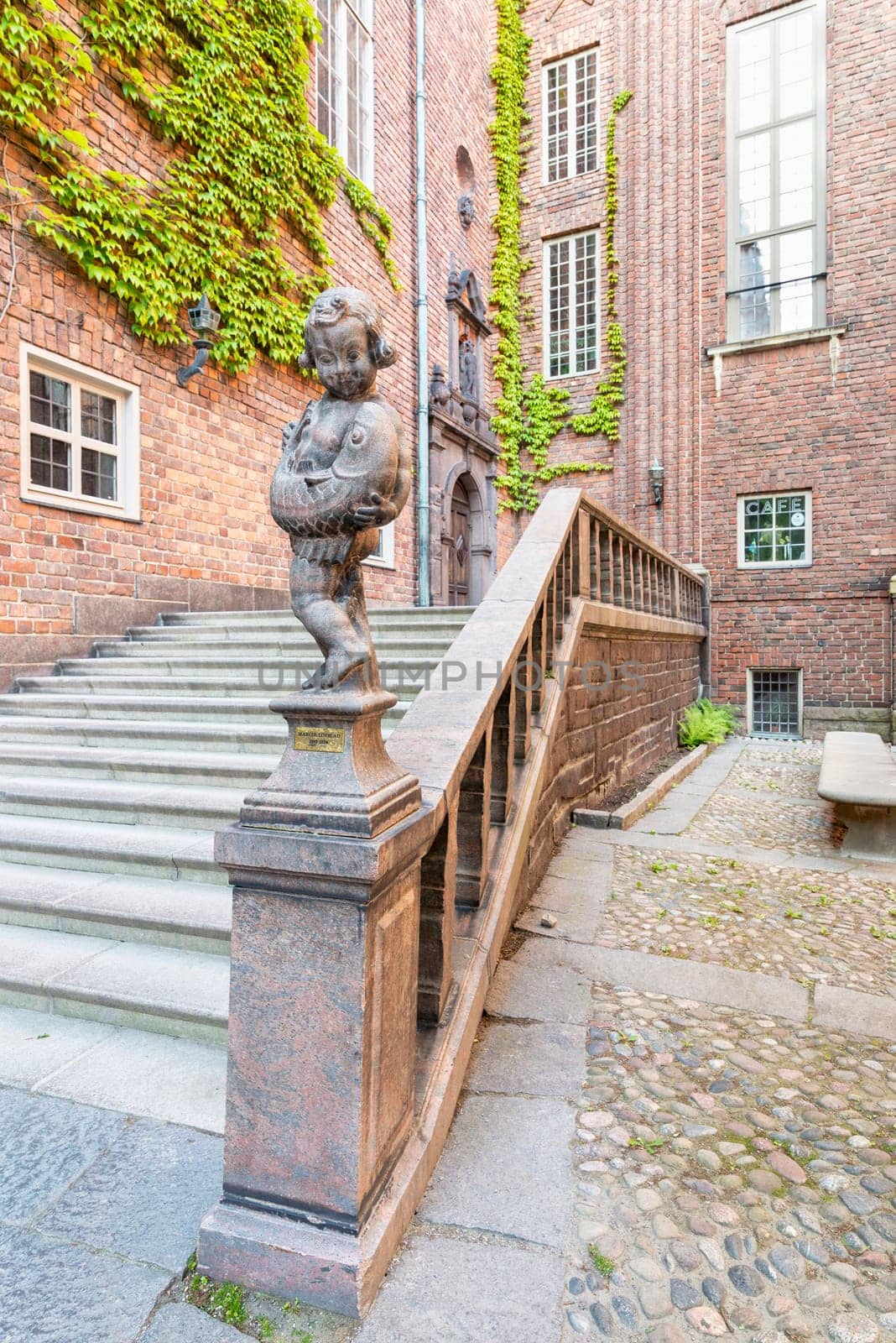 Statue by Marcus Lovblad at the court of Royal Stockholm City Hall, Stadshuset, Kungsholmen island, Stockholm, Sweden