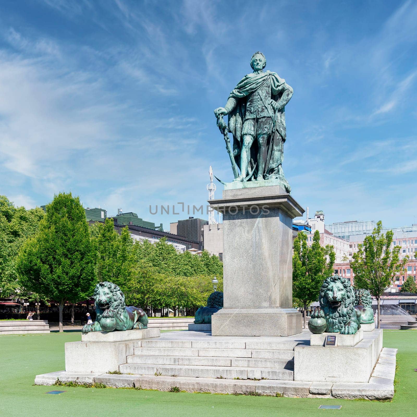Statue of King Carl XIII mediating King's Garden, Kungstradgarden, or Kungsan, a park in Norrmalm district, central Stockholm, in a sunny summer day, Stockholm, Sweden