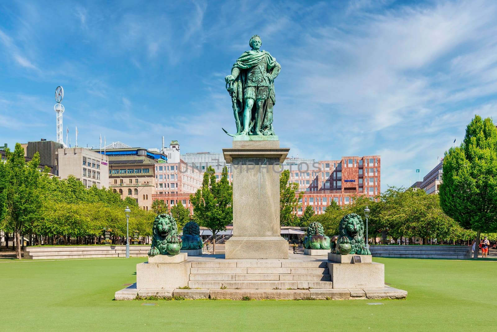 Statue of King Carl XIII mediating King's Garden, Kungstradgarden, or Kungsan, a park in Norrmalm district, central Stockholm, in a sunny summer day, Stockholm, Sweden