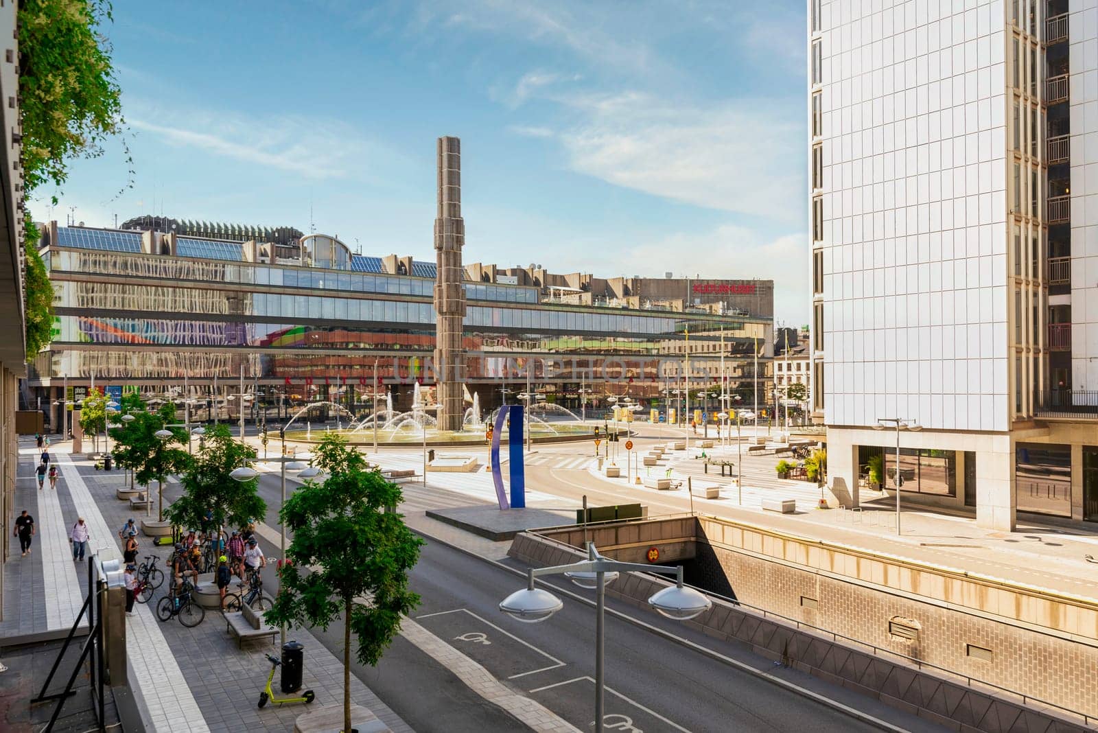 Stockholm, Sweden - June 26 2022: Sergel's Square or Sergels torg with Kulturhuset Stadsteatern, arts and culture center, and the superellipse shaped fountain, at Norrmalm district