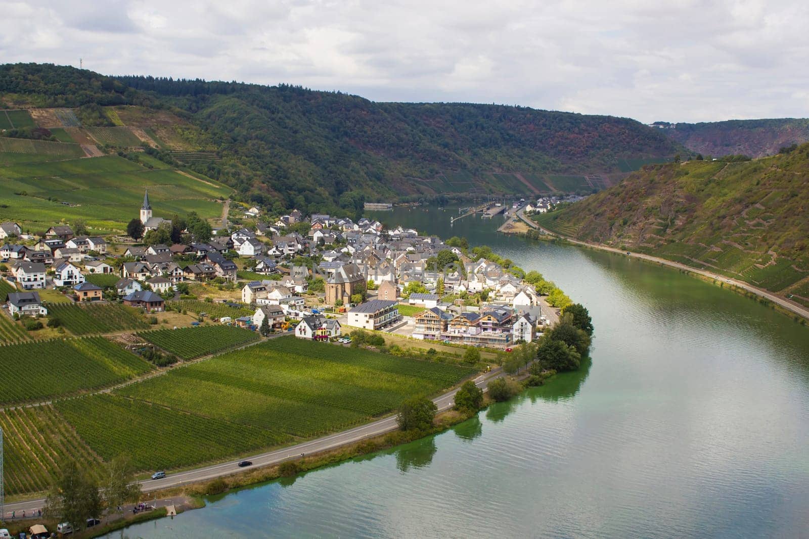 Aerial view of the Moselle valley with vineyards, the river Moselle and the villages Ellenz-Poltersdorf and Poltersdorf seen from castle Metternich in Beilstein, Rhineland-Palatinate, Germany.
